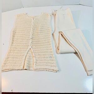 Revolve sweater outfit - Cream pants and crocheted sweater.